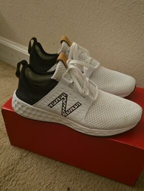 New Balance White Athletic Sneakers with Black Collar and Tan Pull Tabs